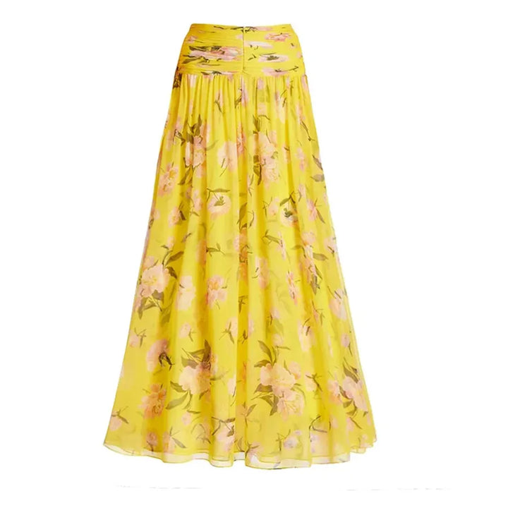 Saída de Praia amarela com mangas bufantes de tule e aplicação de flor em 3D no busto, moda praia feminina elegante.